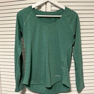 Patagonia women’s running / sun shirt. Great for layering.
